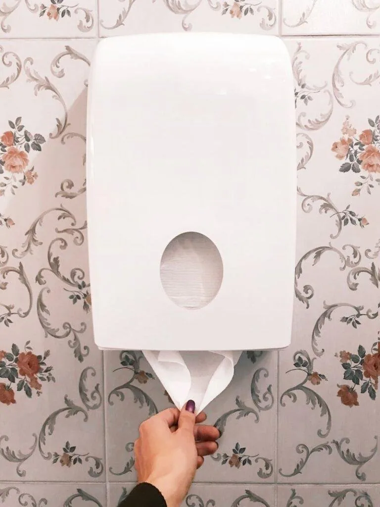 Commercial restroom paper dispensers